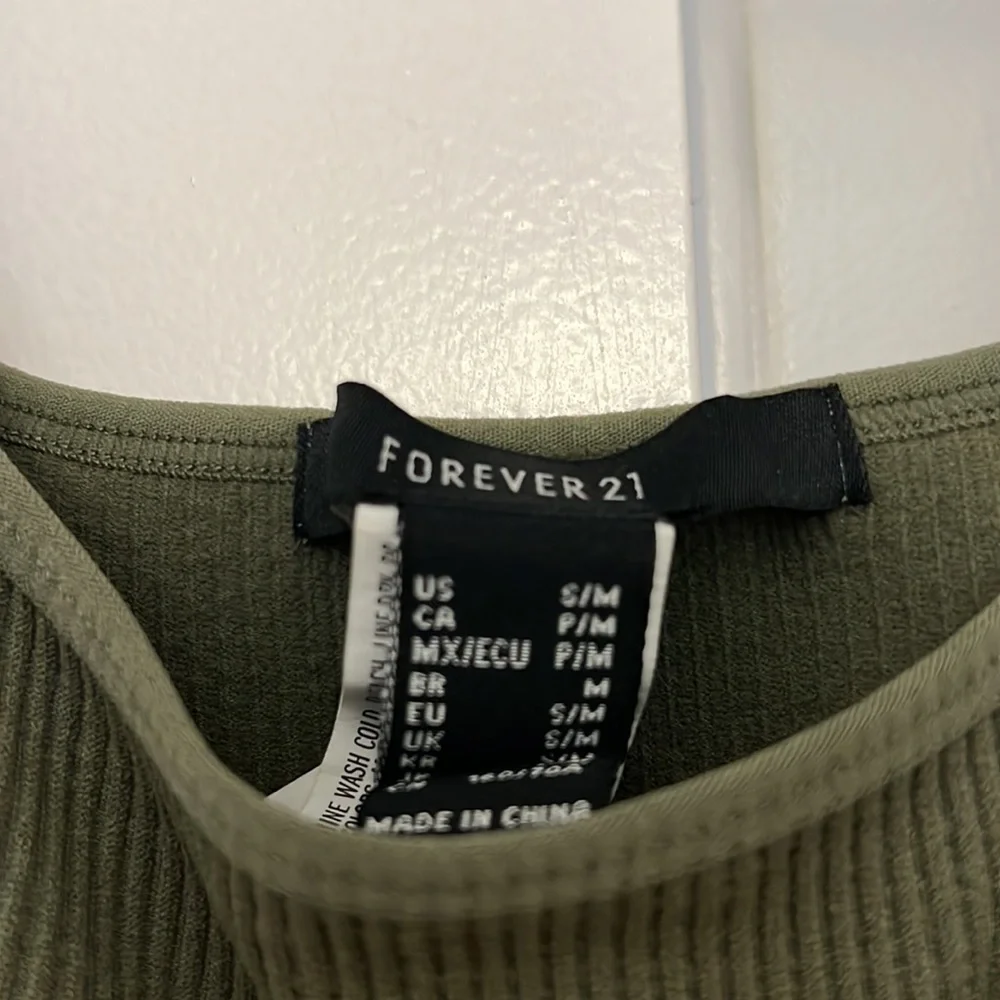 Forever 21 thong bodysuit, never worn, size S/M. - Picture 2 of 2